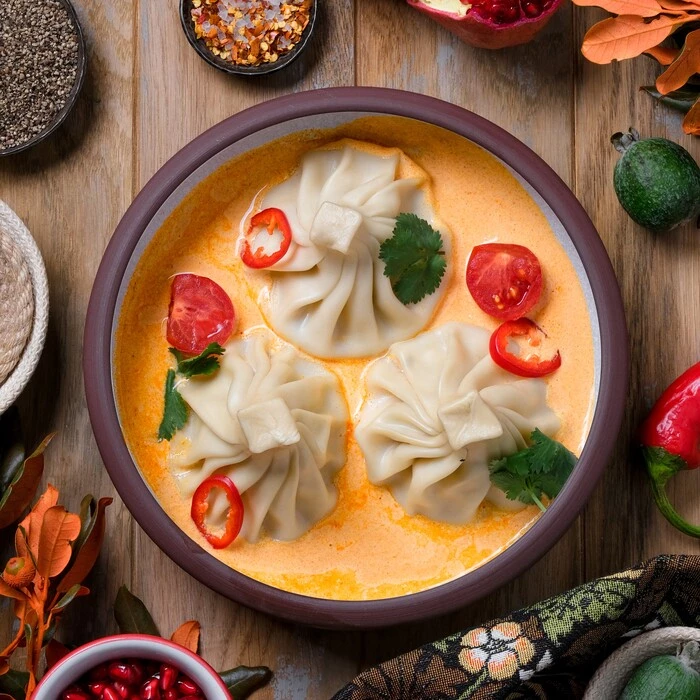 Набор из трёх хинкали №4: Гребешок и креветки в соусе Том Ям