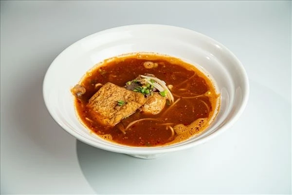 Плоская лапша с говядиной