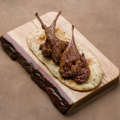 Каре ягненка с овощами гриль 