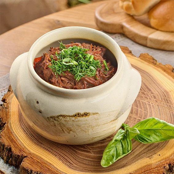 Томленые щеки с овощами