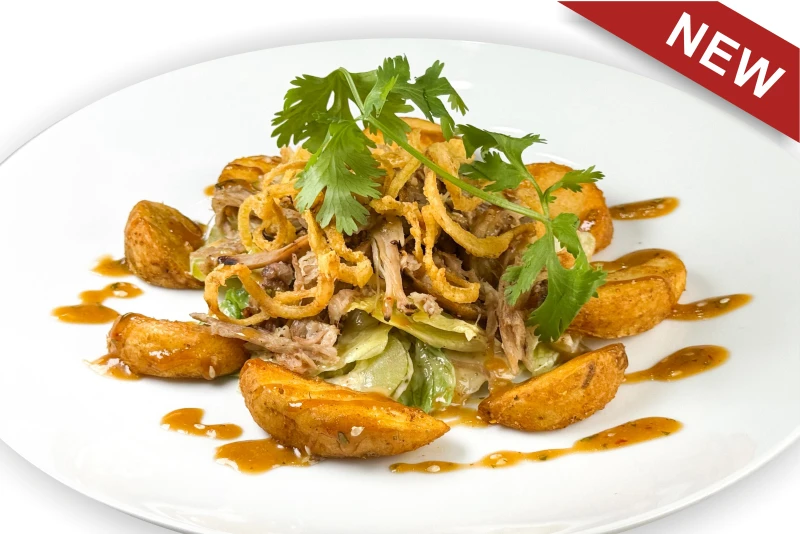 Салат с жареным картофелем, рваной свининой 190 гр