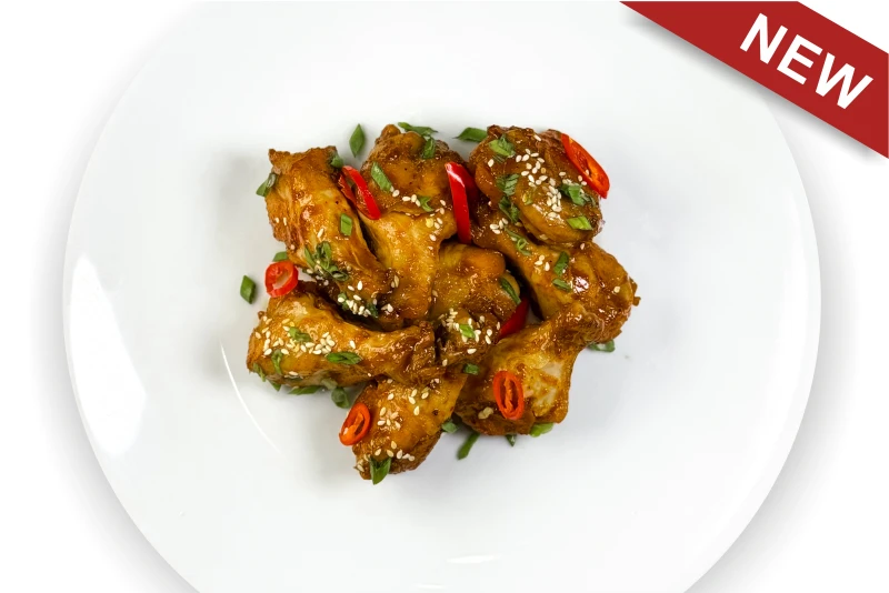 Куриные крылья из смокера в соусе BBQ с перцем.