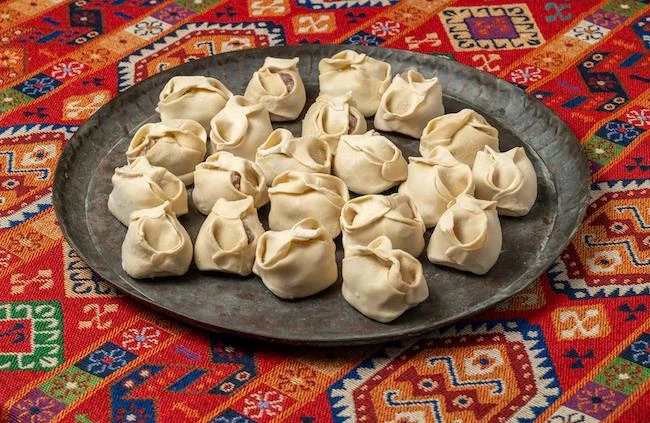 Манты с говядиной кг