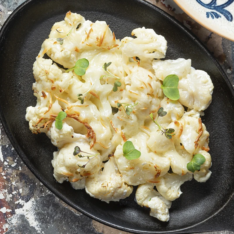 Цветная капуста, запеченная в сливках с сыром