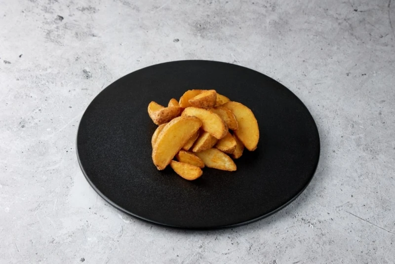 Картофельные дольки 150 гр.