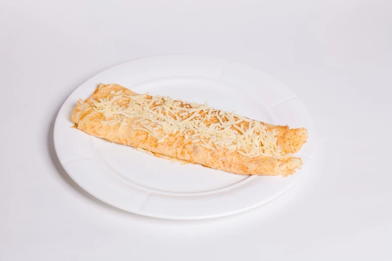 Блинчики с ветчиной в сливочно-сырном соусе